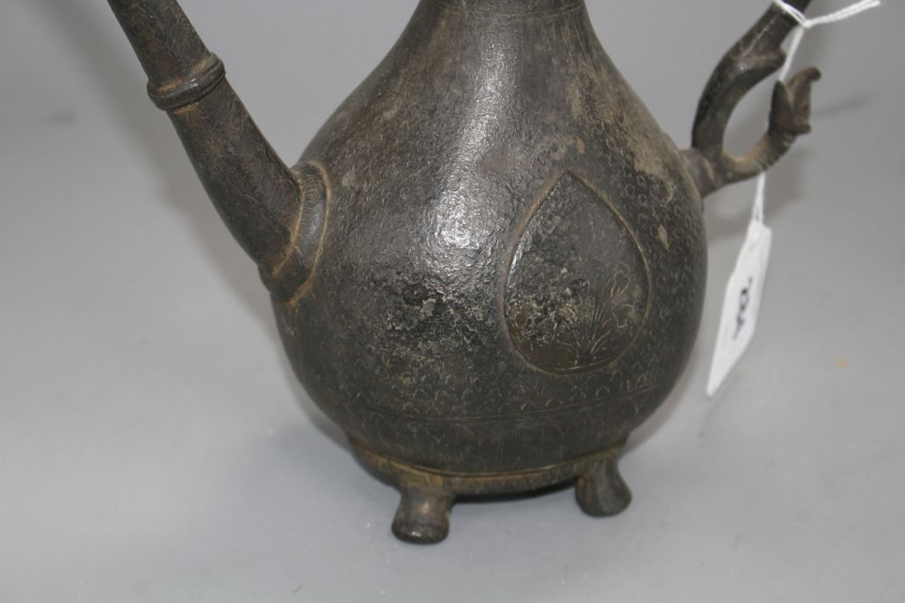 Two late 18th century Mughal brass ewers, H.11in. and 9.75in.